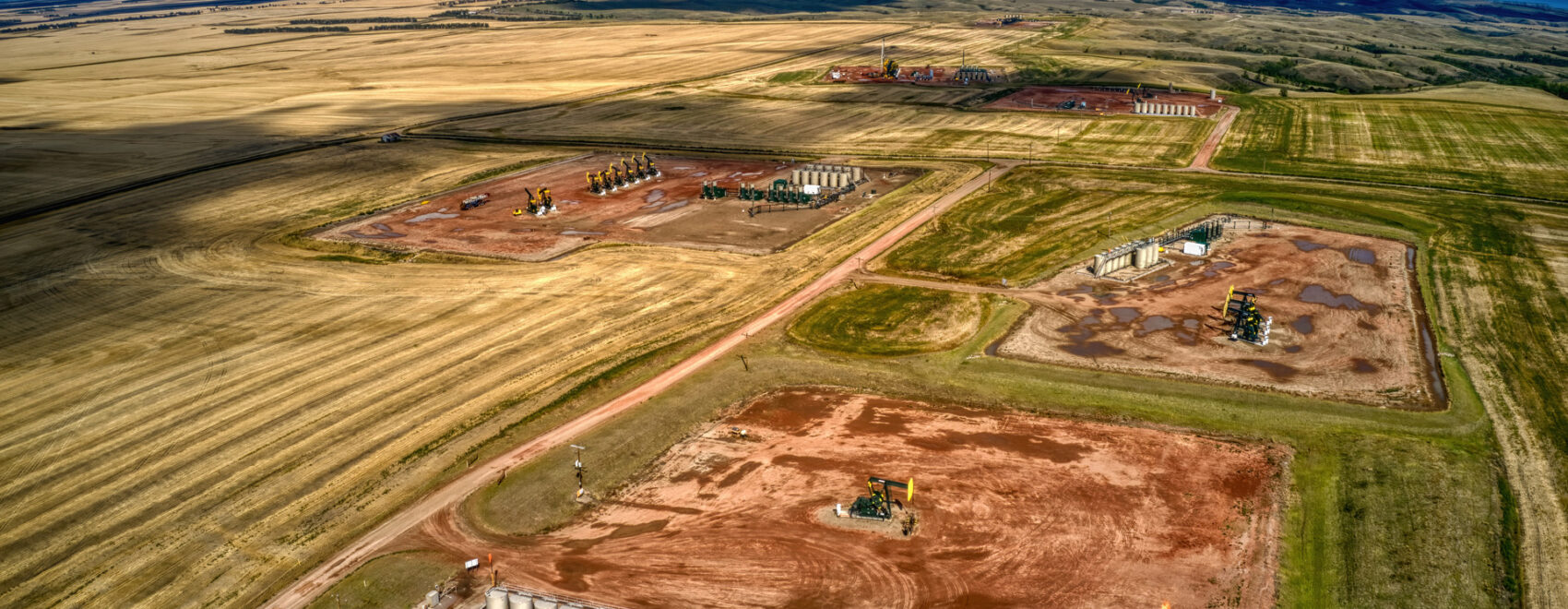 Aerial photo of a north Dakota landscape and oil field.