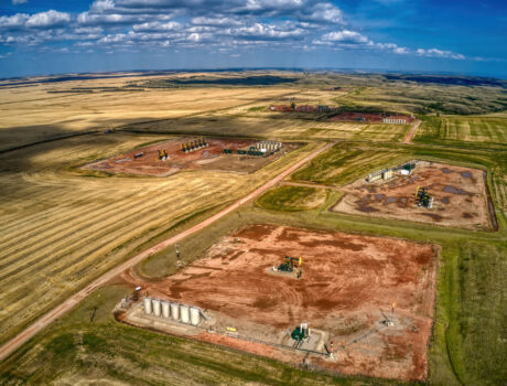 Aerial photo of a north Dakota landscape and oil field.