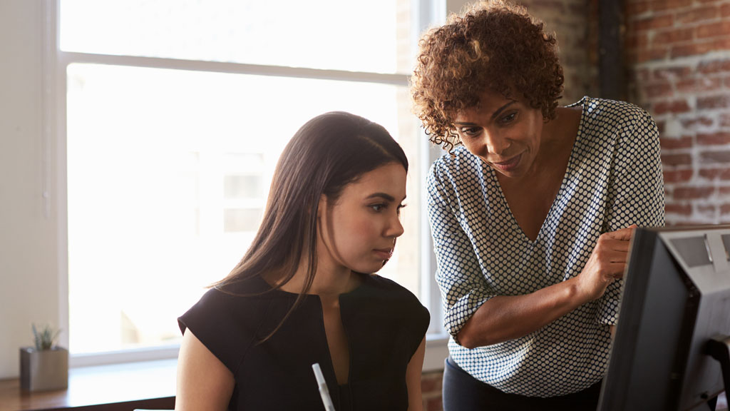 Businesswoman mentoring student