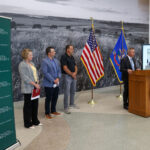 Gov. Armstrong announces the Grain Storage & Facility Rebuilder Program at NDSU. Armstrong was joined by (L-R) Miranda Meehan, NDSU Extension disaster coordinator, James Burgum, CEO at The Arthur Companies, and Steve Johnson, farmer from Page, ND.